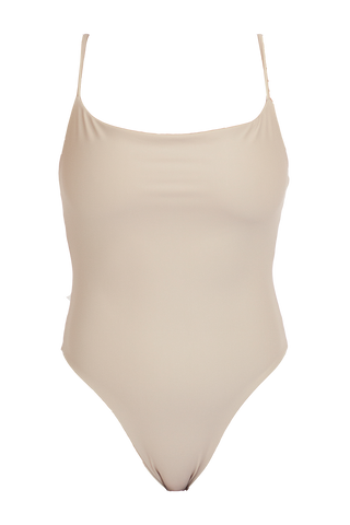 A nude one piece swimsuit with spaghetti straps and a straight neckline.
