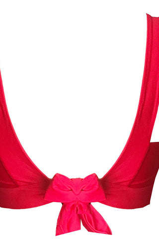 The back of a bright red bikini top with thick supportive straps and an adjustable tie.
